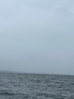 Buoy on horizon